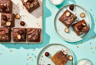 Banana Snacking Cake with Chocolate Malted Cream Cheese Frosting