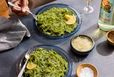 Fresh Herb Pasta being served on two plates