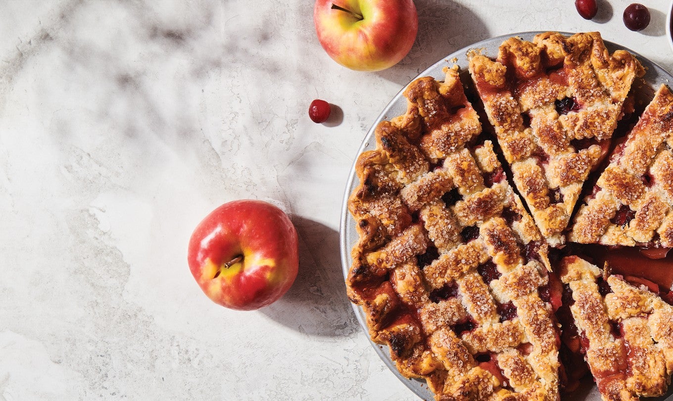 Apple cranberry pies in a pie pan