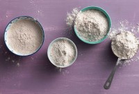 Four bowls of different rye flours