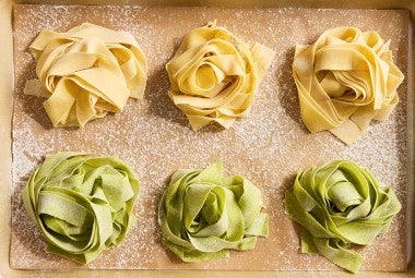 Sourdough Pasta nests on a sheet of parchment